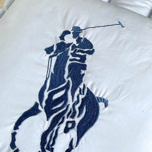 Classic Nest- Light Blue Polo